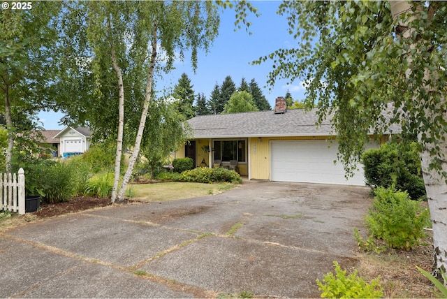3712 NE 60th Ave, Vancouver, WA 98661 - ranch-style house with driveway, a chimney, a garage, and a shingled roof