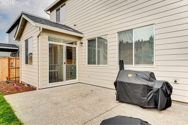 view of patio / terrace with fence and grilling area