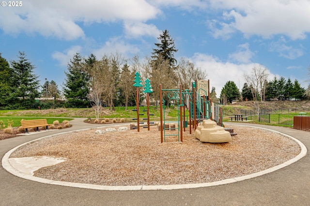 community jungle gym with fence