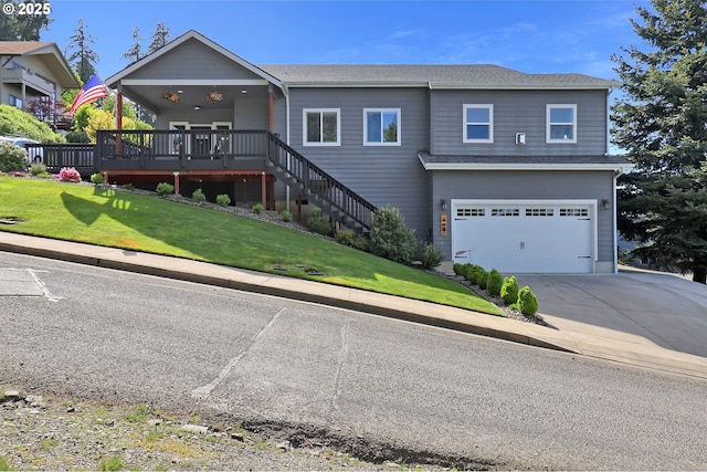 703 Holbrook Ln, Creswell, OR 97426 - view of front facade featuring a garage, a front lawn, concrete driveway, and stairs