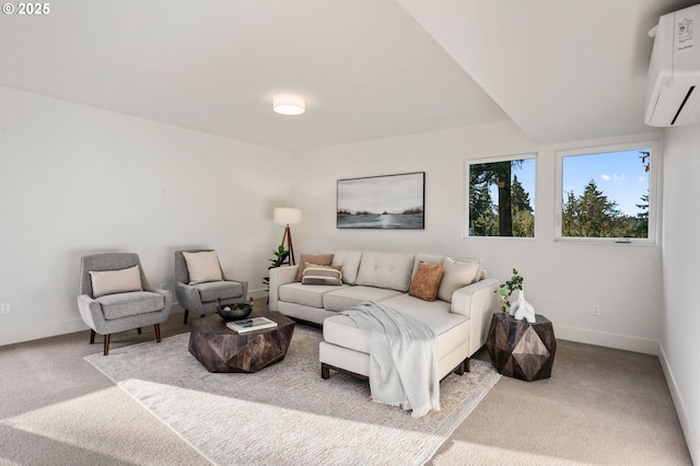 carpeted living area with baseboards and a wall mounted AC