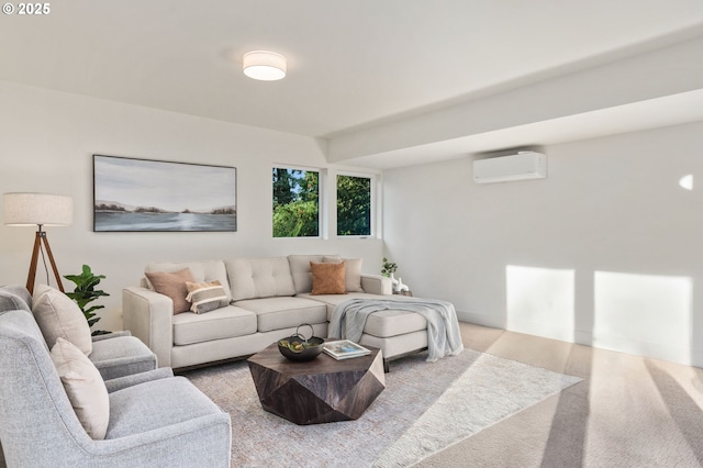 living area featuring a wall mounted AC and baseboards