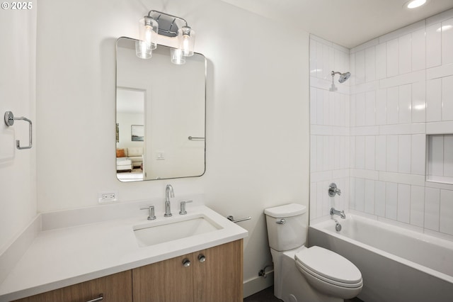 full bath with vanity, toilet, and bathing tub / shower combination