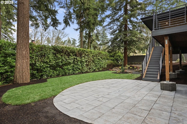 view of patio / terrace featuring stairs