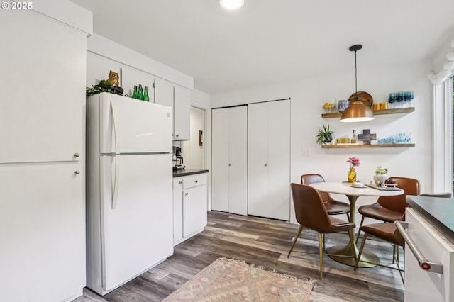 243 Cervantes, Lake Oswego, OR 97035 - kitchen featuring freestanding refrigerator, white cabinets, dark wood finished floors, dark countertops, and open shelves