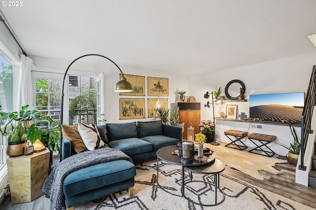 243 Cervantes, Lake Oswego, OR 97035 - living area featuring wood finished floors and a textured ceiling