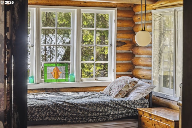bedroom with rustic walls