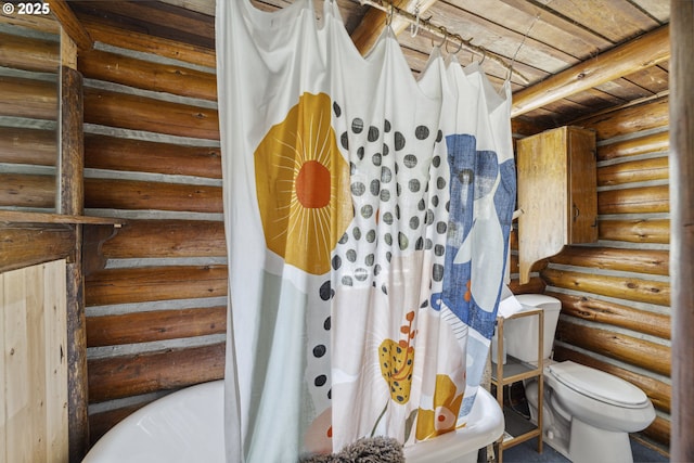 full bathroom with rustic walls, a tub, toilet, a shower with curtain, and wooden ceiling