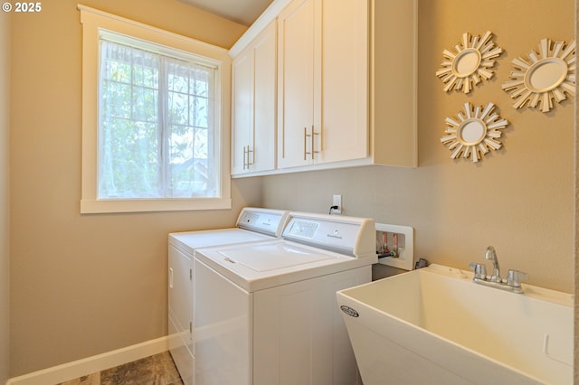 11201 NE 127th Ave, Vancouver, WA 98682 - laundry room featuring cabinet space, washing machine and clothes dryer, and baseboards