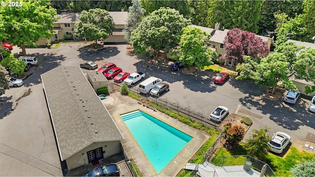 drone / aerial view of a pool area