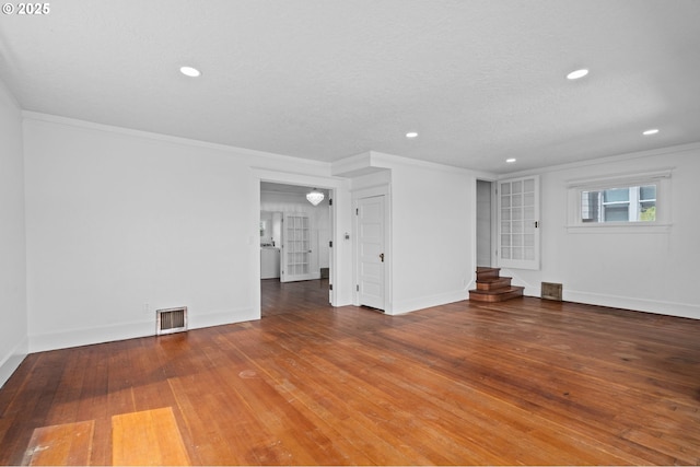 322 W C St, Rainier, OR 97048 - unfurnished living room featuring crown molding, recessed lighting, wood finished floors, and stairs