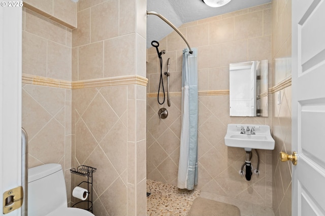 322 W C St, Rainier, OR 97048 - full bathroom with a tile shower and tile walls