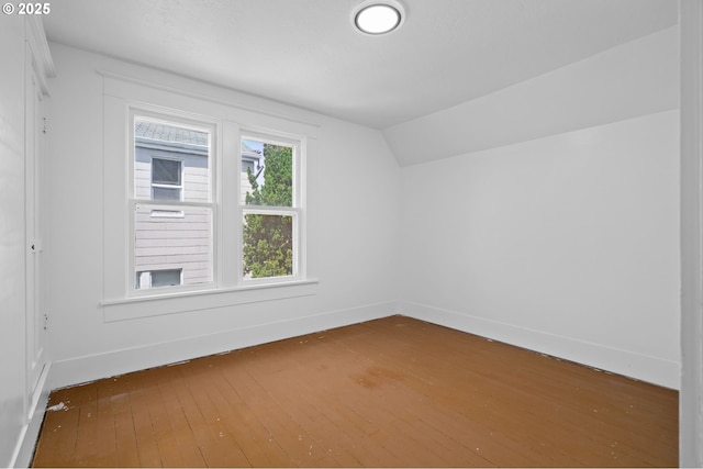 322 W C St, Rainier, OR 97048 - bonus room featuring wood-type flooring and vaulted ceiling