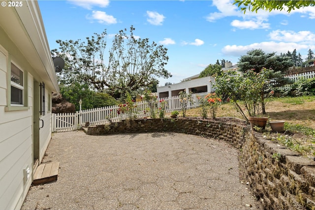 322 W C St, Rainier, OR 97048 - view of yard featuring a patio area
