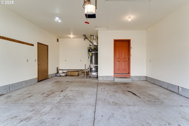 garage featuring water heater and a garage door opener