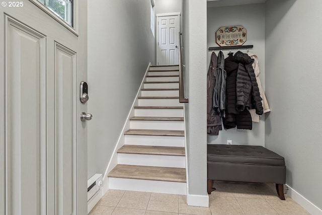 stairs with tile patterned floors