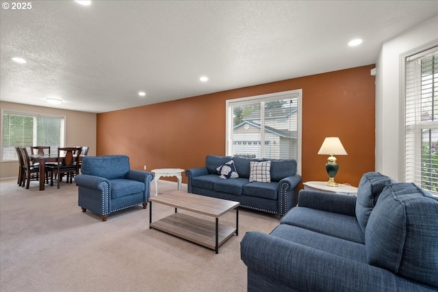 11716 NE 42nd Ct, Vancouver, WA 98686 - living area featuring healthy amount of natural light, light carpet, recessed lighting, and a textured ceiling