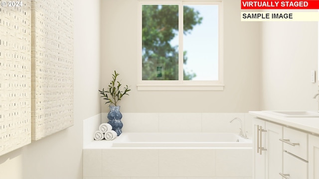 full bath with a garden tub and vanity