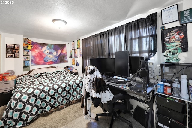 carpeted bedroom featuring a textured ceiling