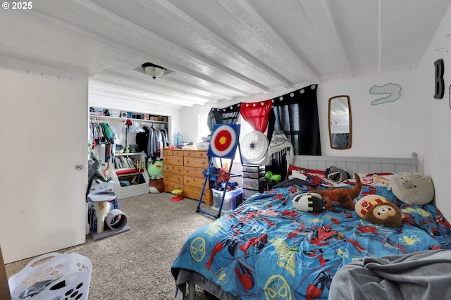 bedroom with a closet and carpet