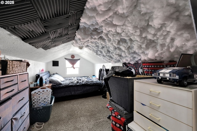 carpeted bedroom with vaulted ceiling