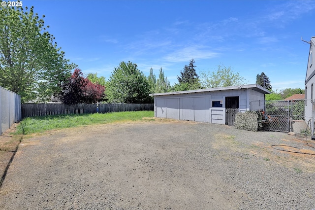 garage with fence