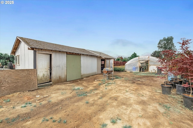 7008 SE 302nd Ave, Gresham, OR 97080 - view of yard with an outdoor structure and a greenhouse
