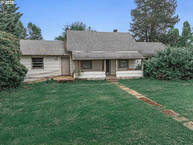 7008 SE 302nd Ave, Gresham, OR 97080 - bungalow-style house featuring a front yard and roof with shingles