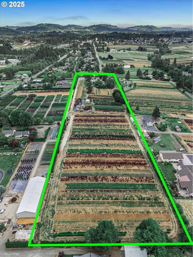 7008 SE 302nd Ave, Gresham, OR 97080 - aerial view of sparsely populated area with abundant farmland, property parcel outlined, and mountains