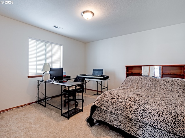 carpeted bedroom with visible vents