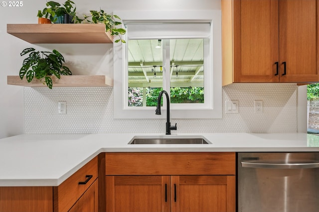 10559 NE Thompson St, Portland, OR 97220 - kitchen featuring dishwasher, a sink, open shelves, and decorative backsplash