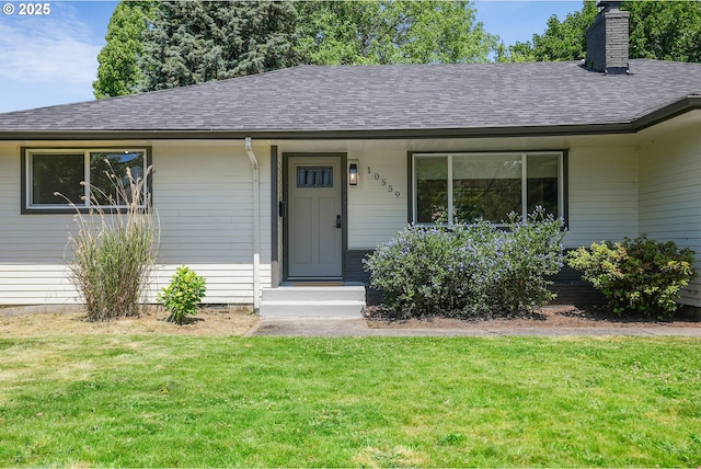 10559 NE Thompson St, Portland, OR 97220 - ranch-style house featuring a shingled roof, a front yard, and a chimney