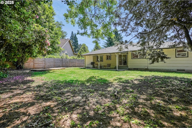10559 NE Thompson St, Portland, OR 97220 - back of property with crawl space and a patio