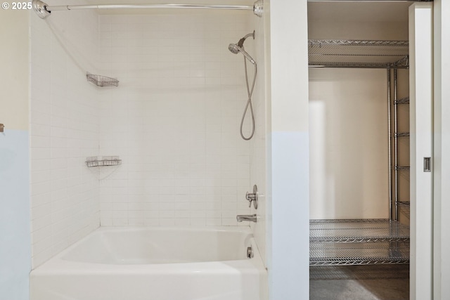 bathroom with shower / bath combination