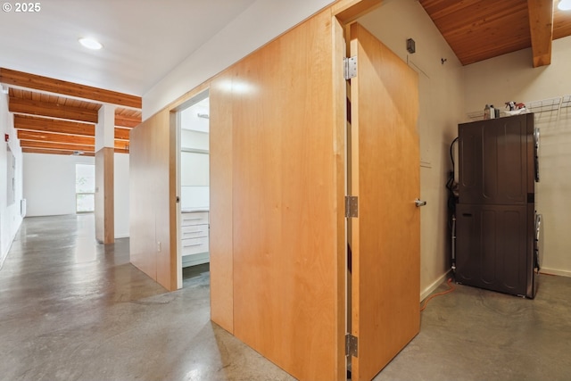 hall featuring finished concrete flooring, wood ceiling, beam ceiling, and recessed lighting