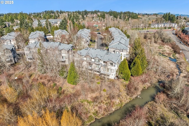 birds eye view of property with a residential view