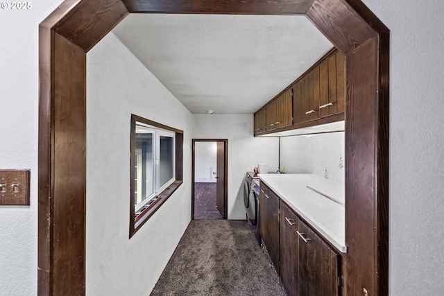 1366 Lakeshore Dr, Coos Bay, OR 97420 - washroom featuring dark colored carpet and a textured wall