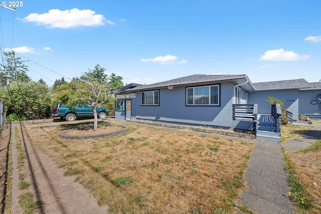 1366 Lakeshore Dr, Coos Bay, OR 97420 - view of front of home with stucco siding