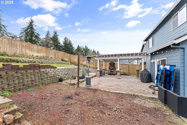 view of yard with a patio area and a pergola