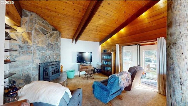 living room with carpet floors, beam ceiling, wood ceiling, a wood stove, and high vaulted ceiling