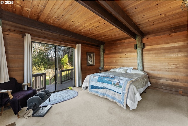 29844 Hound Dog Rd, Gold Beach, OR 97444 - bedroom with carpet floors, wood walls, wood ceiling with exposed beams, and access to outside