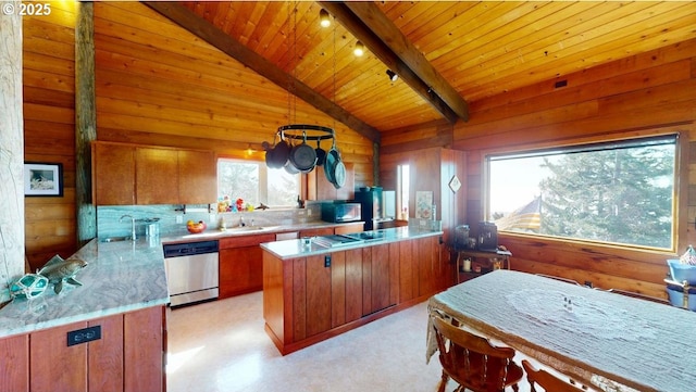 kitchen featuring wooden walls, brown cabinets, a peninsula, and stainless steel dishwasher