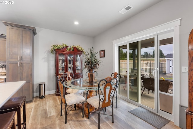 dining space featuring light hardwood / wood-style flooring