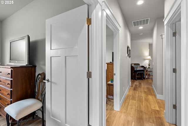 hall featuring light hardwood / wood-style flooring