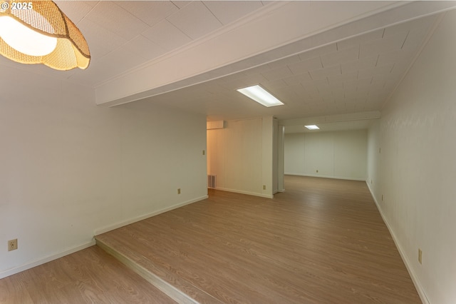 725 N 9th St, Coos Bay, OR 97420 - finished below grade area featuring wood finished floors and baseboards