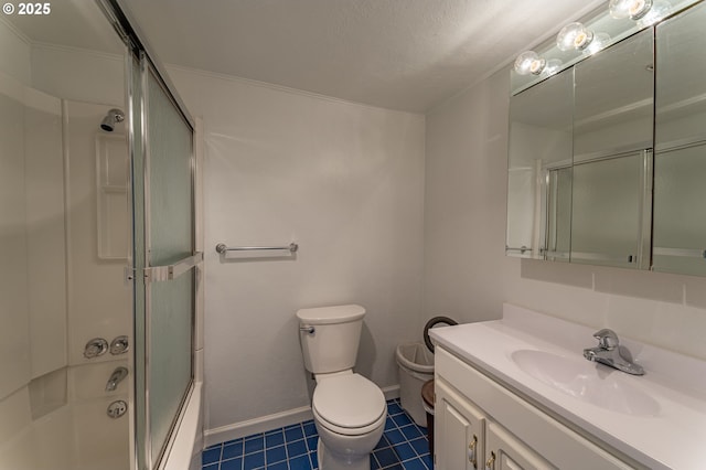725 N 9th St, Coos Bay, OR 97420 - bathroom featuring vanity, toilet, tile patterned floors, combined bath / shower with glass door, and baseboards