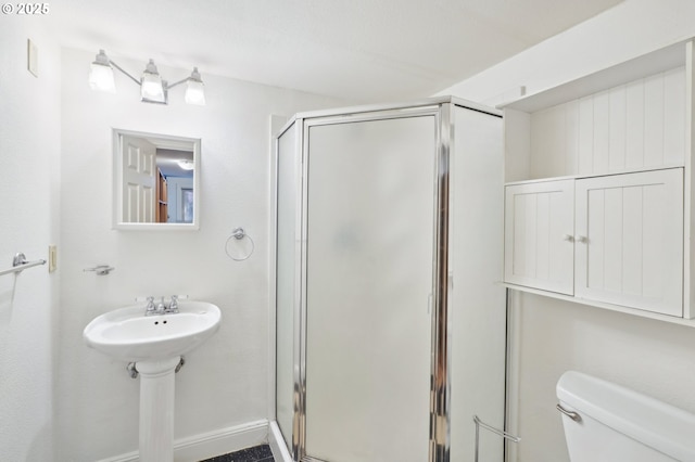 1529 SE Hawthorne Blvd Unit 2, Portland, OR 97214 - full bathroom featuring a stall shower and toilet