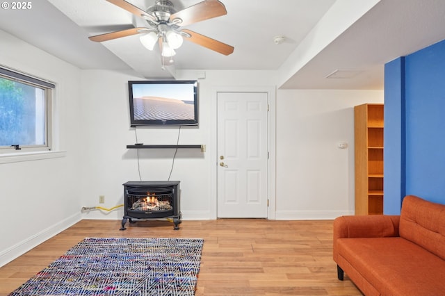 1529 SE Hawthorne Blvd Unit 2, Portland, OR 97214 - living area featuring light wood-type flooring, baseboards, and a ceiling fan