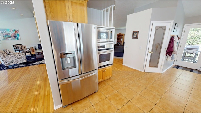94342 Gauntlett St, Gold Beach, OR 97444 - kitchen with appliances with stainless steel finishes, recessed lighting, and light tile patterned floors
