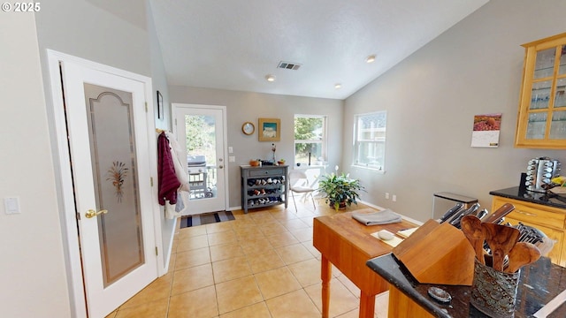 94342 Gauntlett St, Gold Beach, OR 97444 - dining area with lofted ceiling and light tile patterned flooring